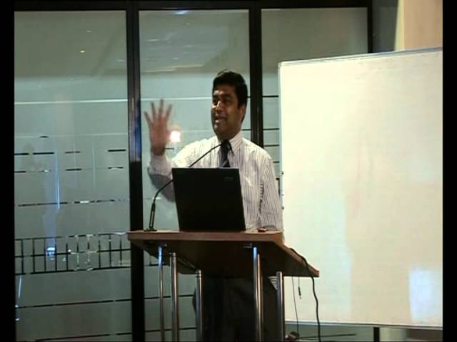 Prof. M. Thilakasiri delivering a workshop address at HNB